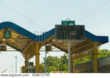 Expressway Sign On Tollgate Shows Way For Car Drivers Paying With Bank Credit Card. Blue Expressway 