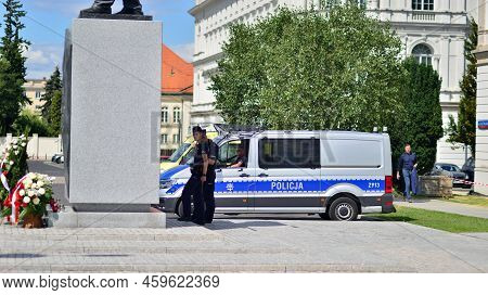 Warsaw Poland. August 10, 2022. Police Officers Guarding The Monument To Lech Kaczynski.