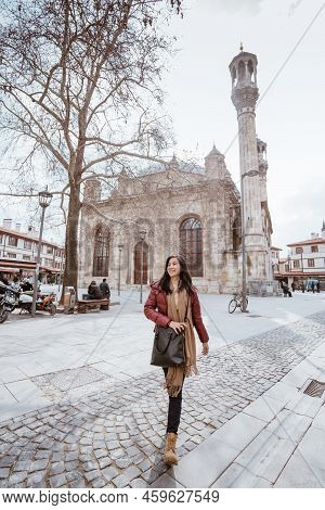 Asian Woman Walking In The Square With Aziziye Mosque
