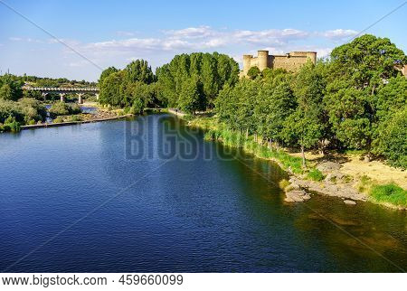 Medieval Castle On A Hill And Next To The Tormes River As It Passes Through The Village Of Barco De 