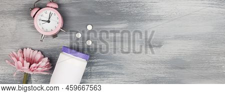 Women Health, Middle Age And Menopause Concept. Health Care Style. Copy Space.white Plastic Bottle W