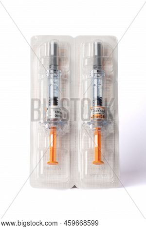 Davis, Ca, July 9, 2022. Two Enoxaparin Injections 
Against White Background, Centered, Above View. 