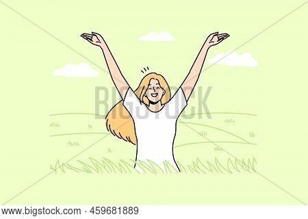 Overjoyed Young Woman In Field Feeling Joyful And Optimistic. Smiling Girl Relax In Summer Meadow En