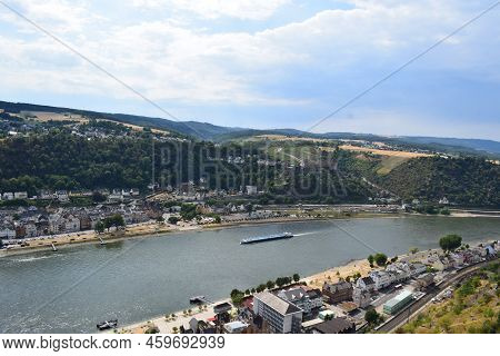 Sankt Goarshausen, Germany - 08 04 2022: Cargo Ship In The Rhine Between Sankt Goar And Sankt Goarsh