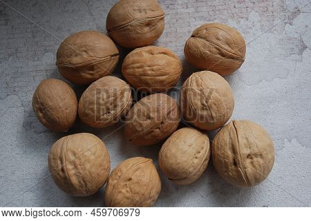 Walnuts With Shells. Background Of Fresh Walnuts.