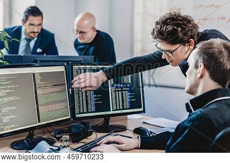 Startup Business Problem Solving. Software Developers Working On Desktop Computer.