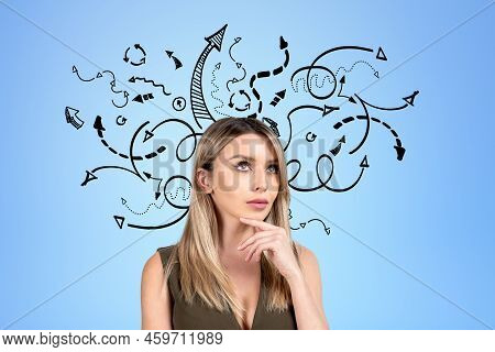 Pondering Attractive Businesswoman Wearing Formal Wear Is Standing Touching Chin Near Blue Wall With