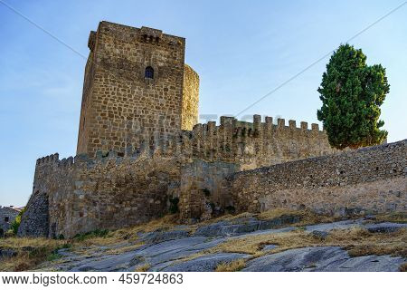 Medieval Castle With Its Tower And Wall At Sunset On A Summer Day, Puente Congosto, Salamanca.