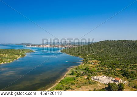 Ivinj Archeological Site With Saint Martin Church And Town Of Pirovac In Background, Croatia