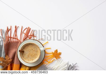 Autumn Mood Concept. Top View Photo Of Cup Of Hot Drinking With Cinnamon Stick Yellow Maple Leaves A
