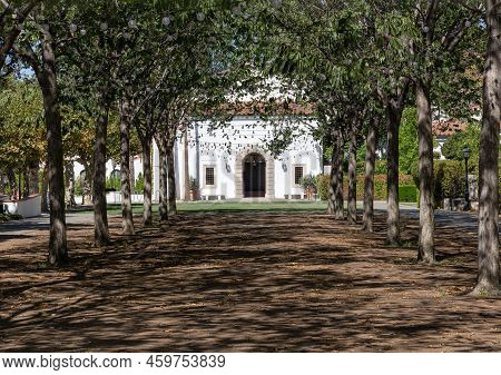 Claremont, Ca - August 13 2022:  View Of A Building At Scripps College Through A Corridor Of Trees