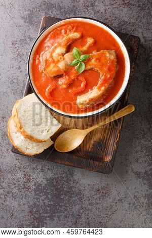 Tomato Soup With River Fish Carp, Vegetables And Paprika Close-up In A Bowl On The Table. Vertical T
