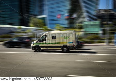Armored Van Truck Of Sber Running Collecting Cash. Bullet-proof Automobile For Transportation Of Mon