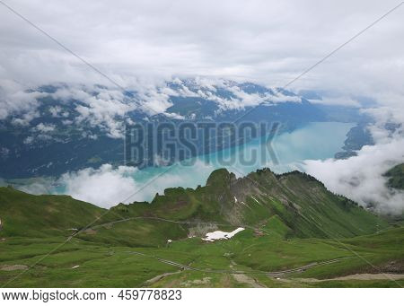 Lake Brienz On A Rainy Summer Day. View From Mount Brienzer Rothorn.
