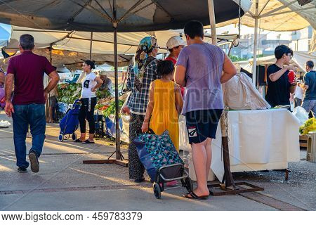 Bazaar In The Turkish City Near Alanya, People Buy Groceries, Vegetables, Fruits