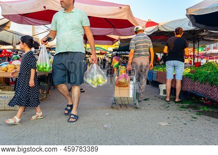 Bazaar In The Turkish City Near Alanya, People Buy Groceries, Vegetables, Fruits
