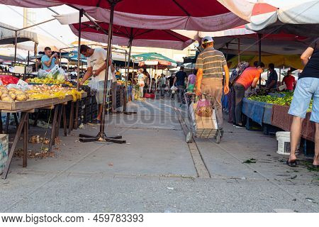Bazaar In The Turkish City Near Alanya, People Buy Groceries, Vegetables, Fruits