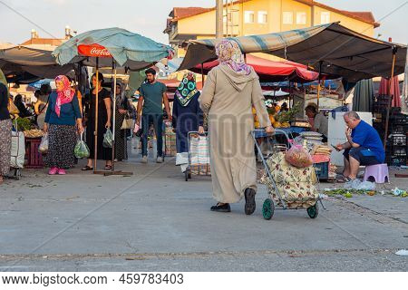 Bazaar In The Turkish City Near Alanya, People Buy Groceries, Vegetables, Fruits