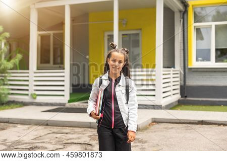 Nine Years Old Girl Student At School.