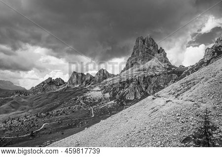 Averau Mountain And Rifugio Averau In Dolomites, Italy. Black And White Image.