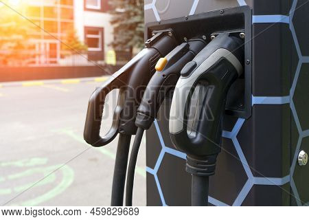 Charging Station For Electric Cars. Types And Connectors Of Ports For Charging Vehicles.