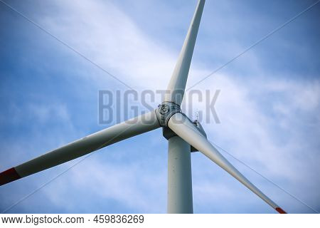 Close-up Of The Hub Of A Wind Turbine. Blade And Hub Of A Wind Turbine.