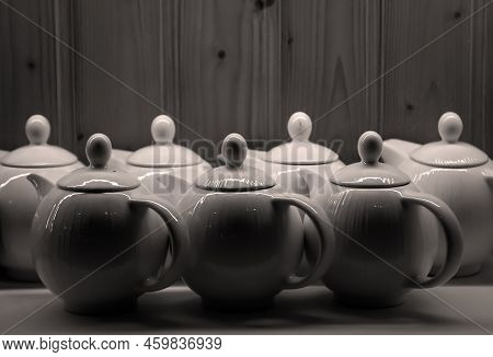 Many Coffee Pots Stand Side By Side In One Compartment.