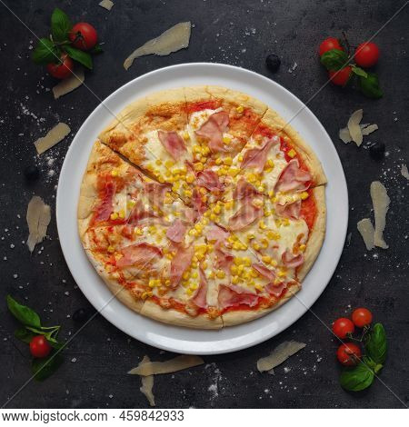 Top Down Pizza Shoot With White Plates In Restaurant