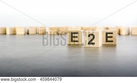 E2e - Exchange To Exchange - Letter Pices On The Wooden Cubes