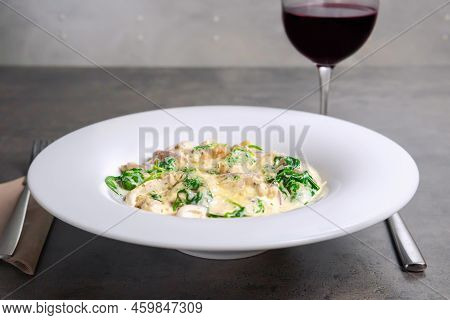 Italian Gnocchi With Roasted Chicken Breast And Spinach And Red Wine