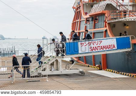 Osaka, Japan - November 27, 2018: Officer Checking For Safety Of Tourists To Get Down From Santa Mar