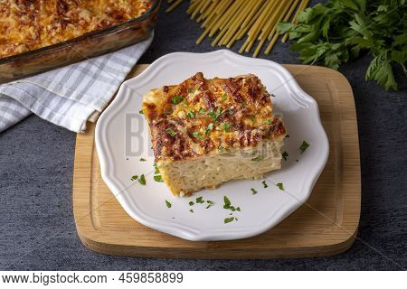 Pasta Casserole Bechamel Sauce Topped With Melted Mozzarella Cheese And Served In A White Baking Dis