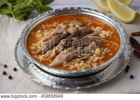 Turkish Soup Beyran With Lamb Meat, Rice, Chopped Garlic And Vinegar Sauce. Traditional Organic Food