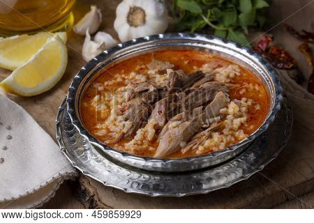 Turkish Soup Beyran With Lamb Meat, Rice, Chopped Garlic And Vinegar Sauce. Traditional Organic Food