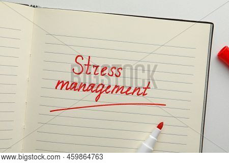 Notebook With Words Stress Management And Marker On White Background, Flat Lay