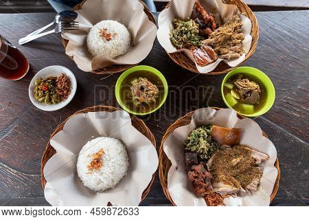 Balinese Traditional Food Rice With Babi Guling And Sambal Terasi