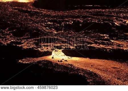 Flowing Lava Close Up At Night. Volcano Eruption At Meradalir Near Fagradalsfjall, Iceland.