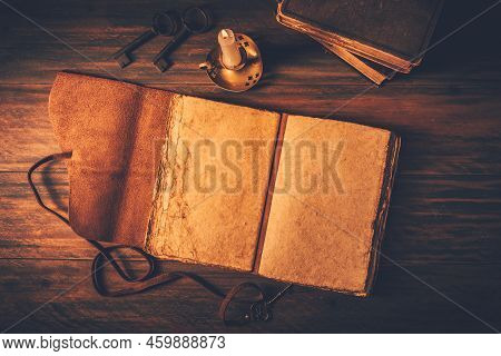 Blank Antique Leather-bound Journal, Book Or Diary With Old Books And Candle