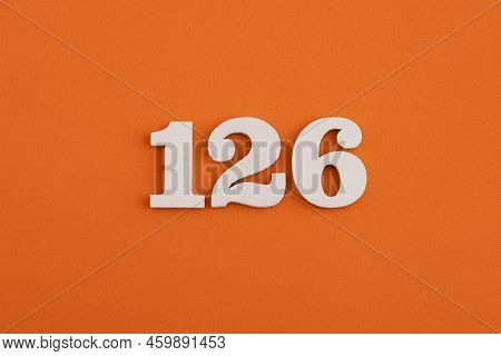 White Wooden Number 126 On Eva Rubber Orange Background