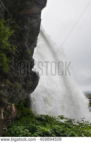 Water From The Fosselva River Drops Down The 50 M High Powerful Steindalsfossen, Norway