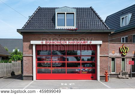 Harskamp, Gelderland, The Netherlands - 07 14 2022 - Firefighter Agency Facade Painted In Red