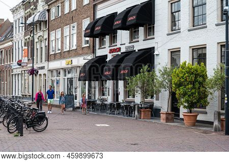 Zaltbommel, Gelderland, The Netherlands - 07 12 2022 - People Sitting On Sunny Terraces In Old Town