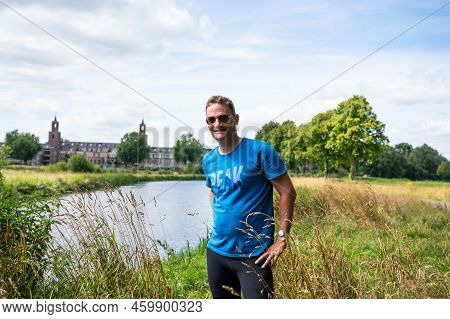 Breda, North Brabant, The Netherlands, 08 09 2022 -   40 Year Old Man Standing At A Nature Reserve A