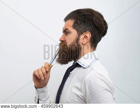 Thinking Man. Portrait Of A Teacher Or Professor At Classroom. Satisfied Serious Mature Teacher. Mat
