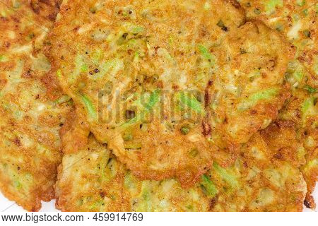 Fried Small Thick Savory Zucchini Pancakes, Top View Of Fragment Close-up