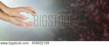 Female Spiritual Healer Calming Dark Negative Energies - Cupped Hands Sending Gentle Energy Dispersi