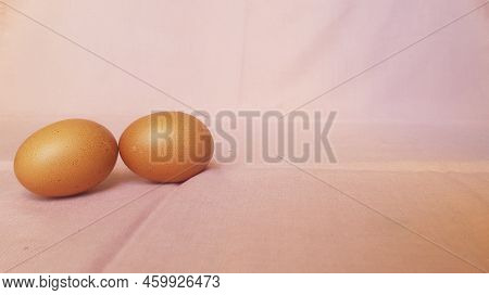 A Few Eggs On A Pink Cloth.