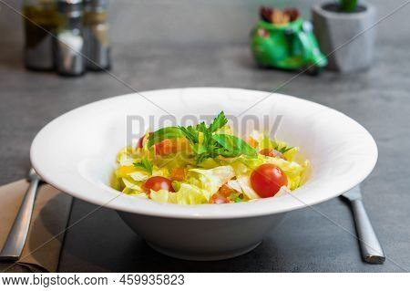 Vegetarian Appetizing Fresh Salad Served In A White Plate