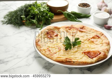Delicious Khachapuri With Cheese On White Marble Table