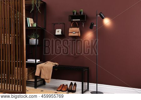 Modern Hallway Interior With Stylish Furniture And Key Holder